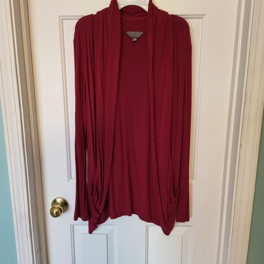 Beautiful, soft, red cardigan. Long sleeve with pockets! Excellent condition.
